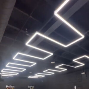 The ceiling of a gym in GTA is lit up with custom "U-Turn" LED Hex Lights.